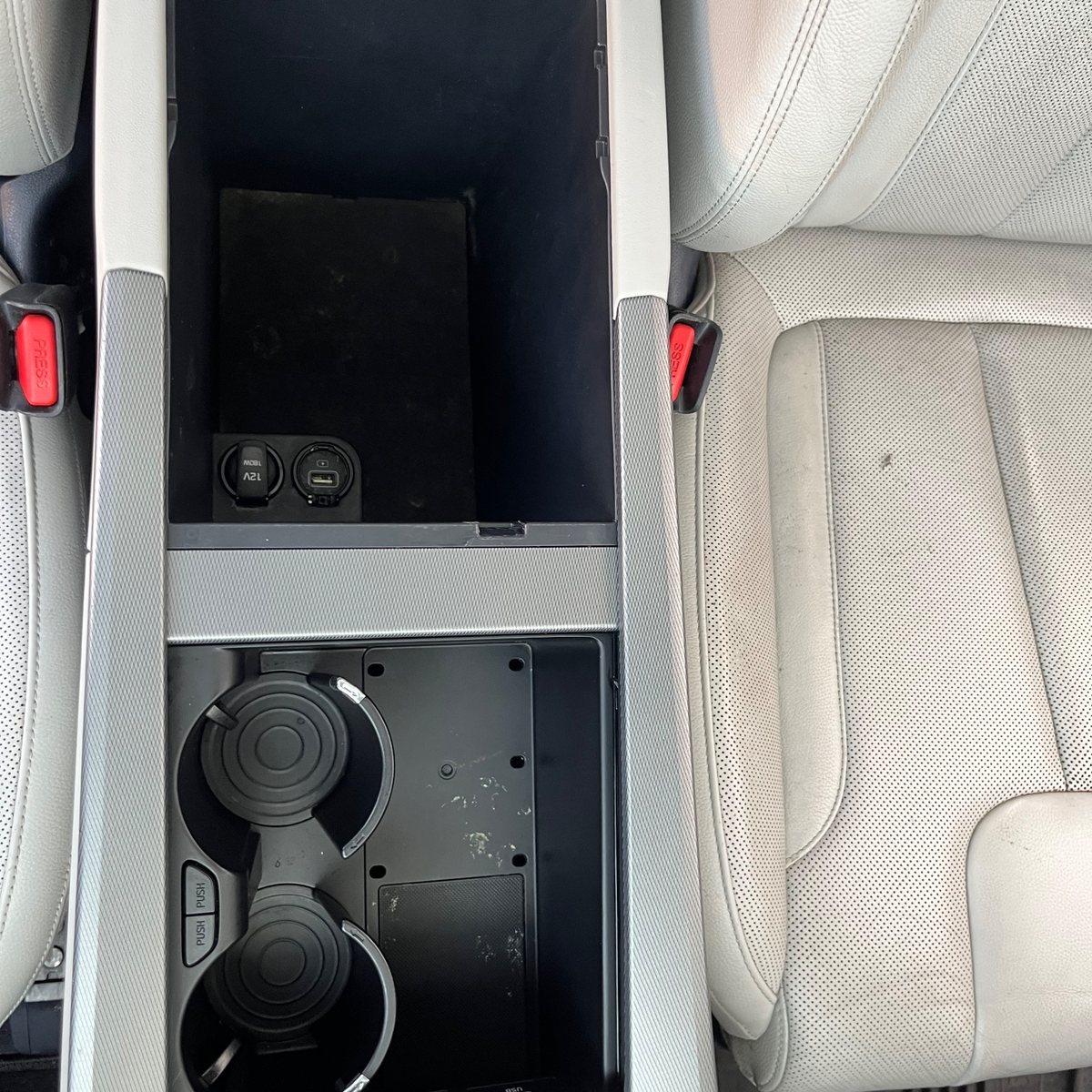 The same rear centre console cleaned out, with the cupholder insert refitted
