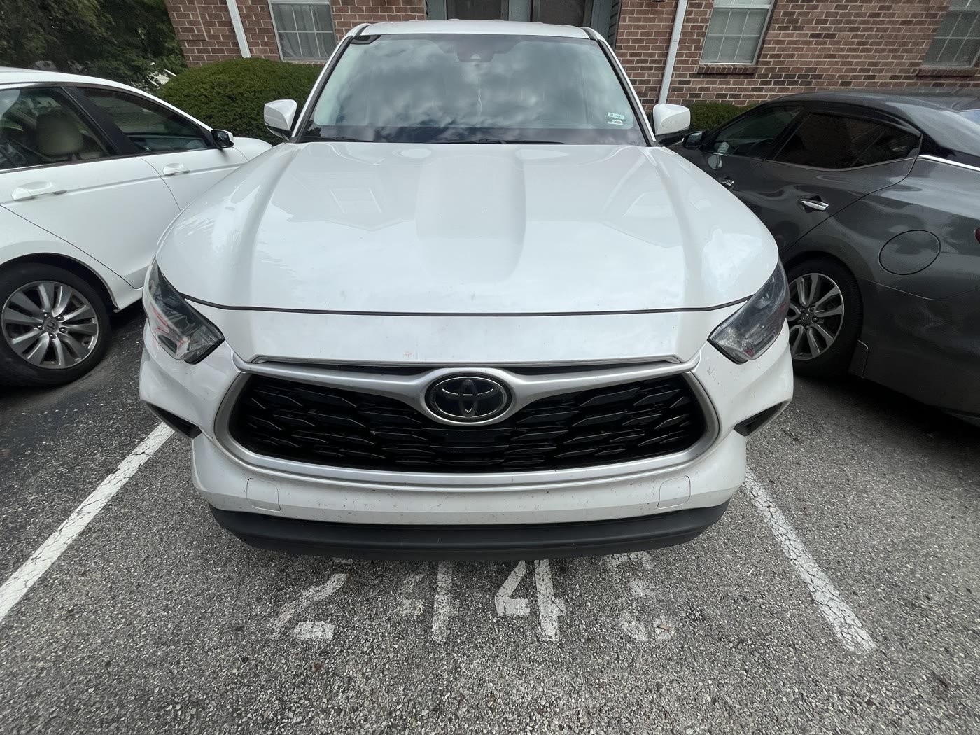A white Toyota washed down front to back by Alum Auto Detailing, Westerville