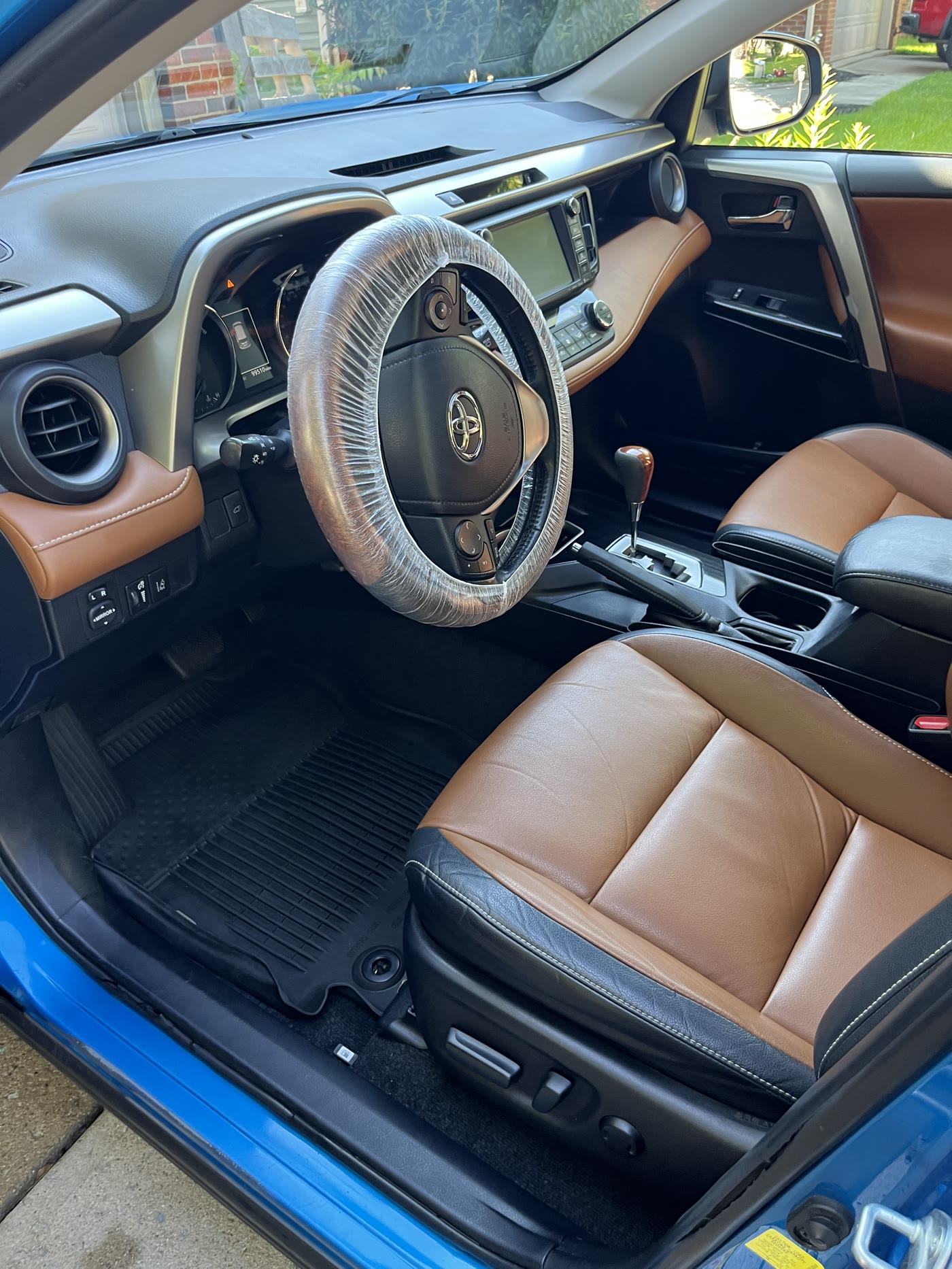 Saddle leather seats brought back to life by Alum Auto Detailing, Westerville